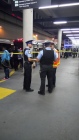 Special Constables and a TTC official discuss transit shutdown after stabbing.